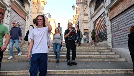 crowd descending steps in venice, italy