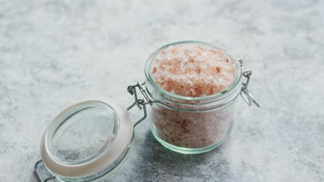 glass jar with pink salt