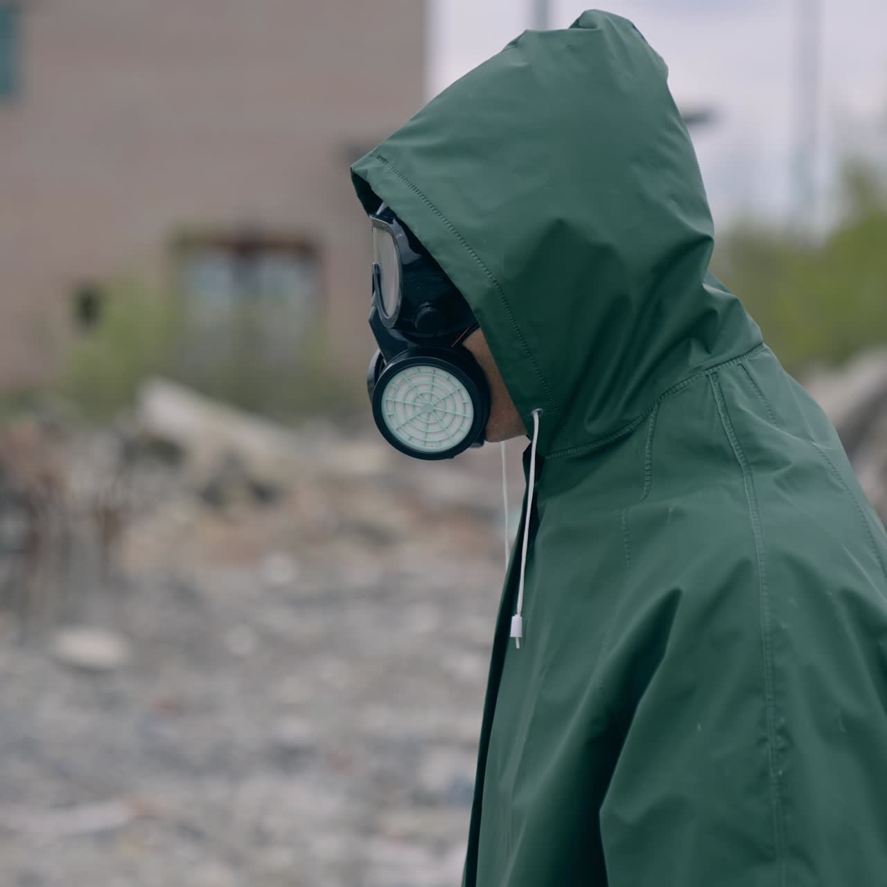 Industrial radiation environment pollution. Man wearing gas protection suit