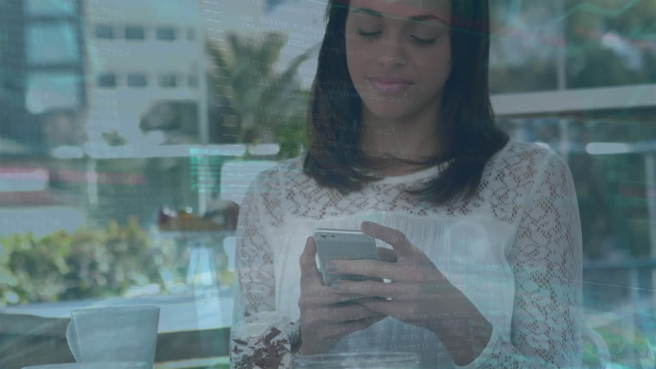 Animation of computer programming language over smiling biracial woman using cellphone in cafes