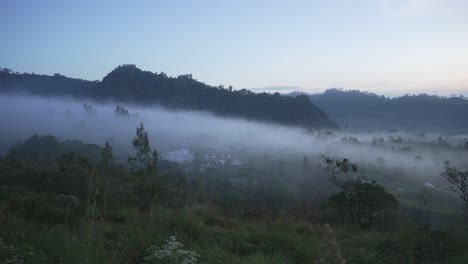 misty mountain valley at dawn