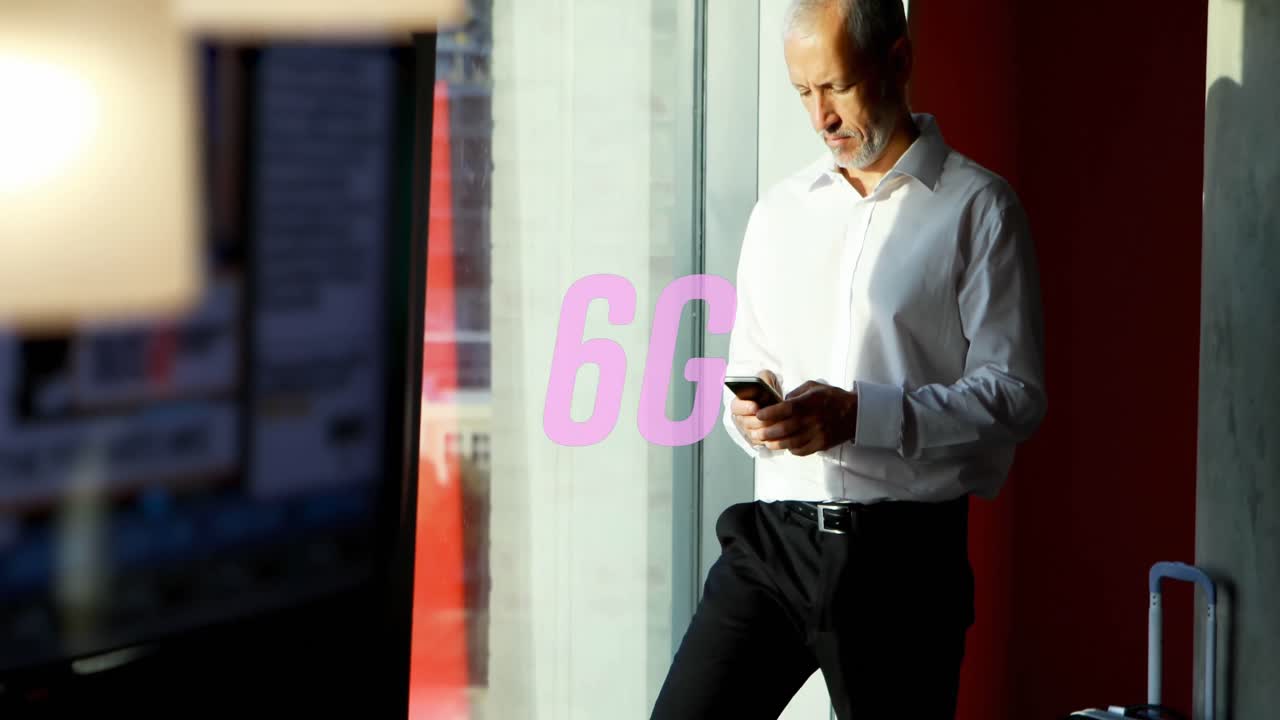 Animation of 6g text over caucasian businessman using smartphone