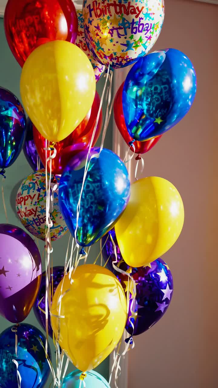 Vibrant birthday balloons in a close-up, eye-level shot