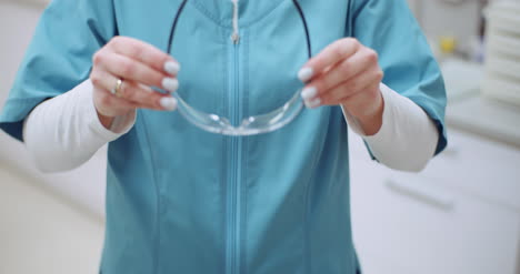 Female-Doctor-Wearing-Protective-Mask-On-Face-And-Put-Glasses-Doctor-At-Healtcare-Clinic-2