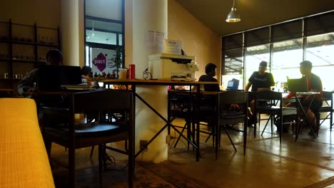 interesting motion lapse in the work-space in famous coffee shop. concept office work-space