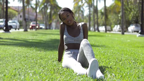 black woman on green lawn