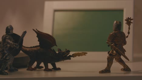 toy knights and dragon figurines