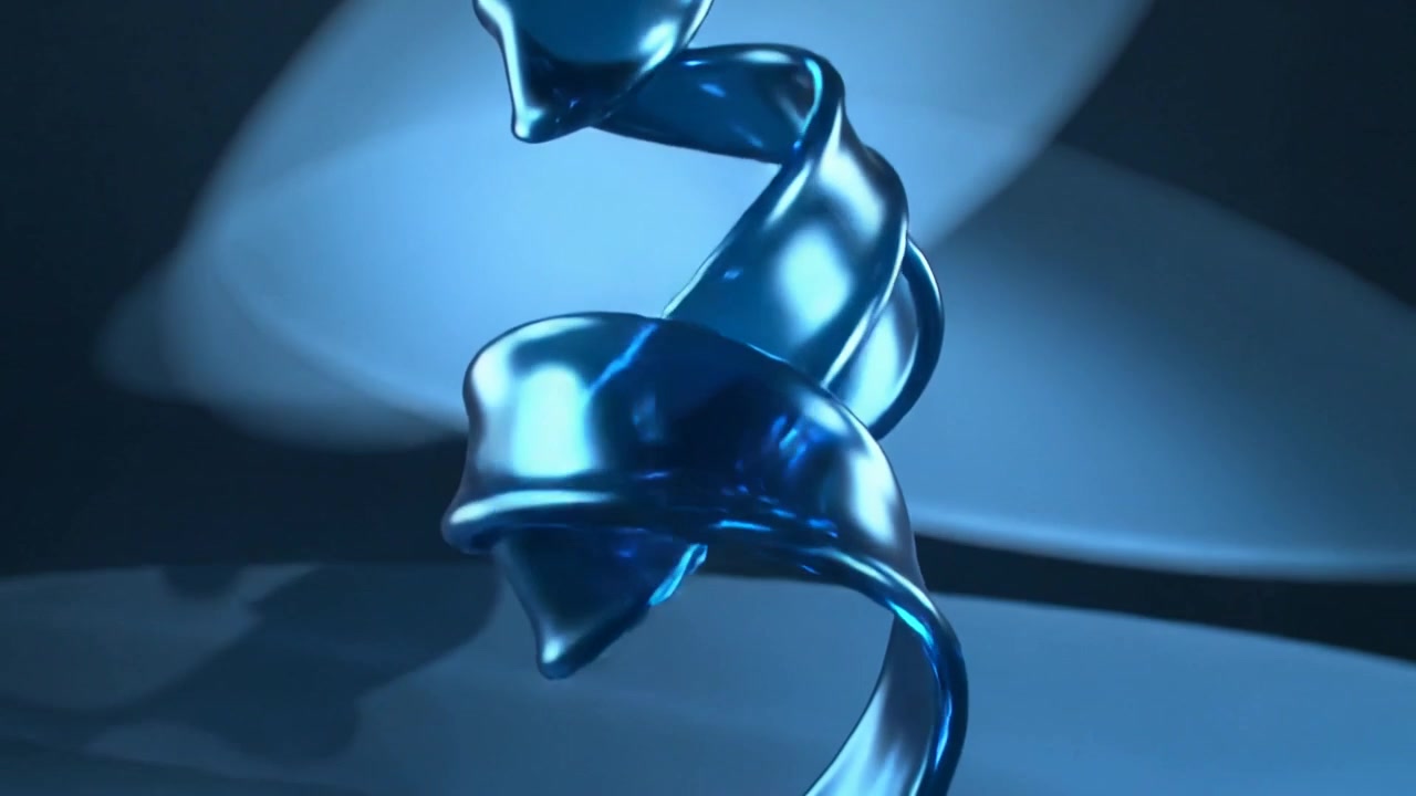 Recording camera capturing rotating blue ribbon descending toward mirror stage, with oval backlight