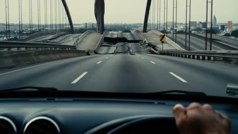 approaching a collapsed highway from a driver's perspective