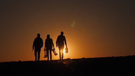 farmers at sunset