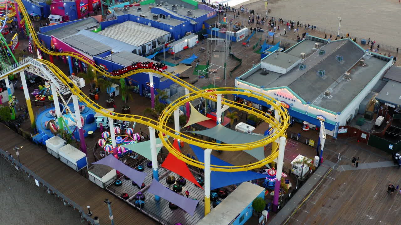 Aerial view of Santa Monica Pier's Pacific Park and surrounding beach