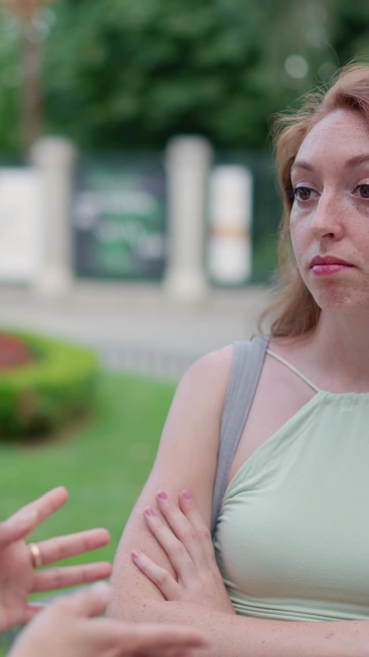 Close-up of a Redhead Woman with Freckles Showing Different Facial Expressions