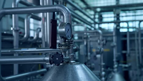 industrial mechanism on a dairy farm. modern equipment inside the milk farm. production of dairy products. food production industry.