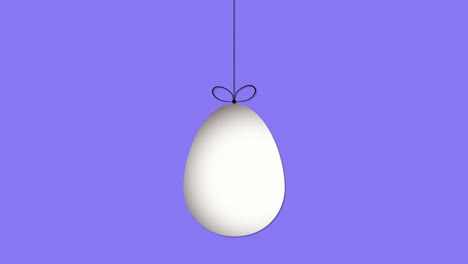 hanging egg on vibrant blue background