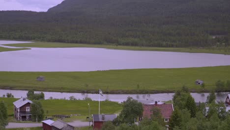 a small scandinavian village in the north with a big lake in the middle