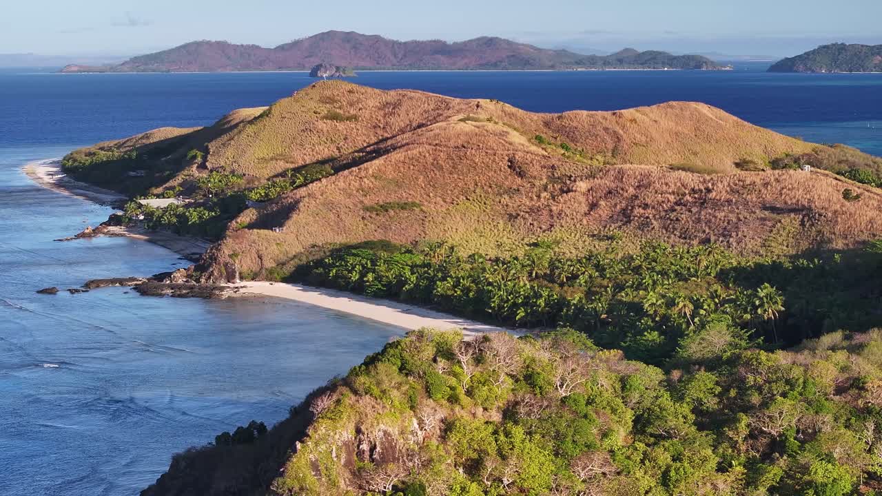 Picturesque sandy beach in remote island in Fiji. Travel destination, island hopping. Mana Island