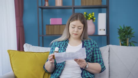 the young woman reading the prospectus.