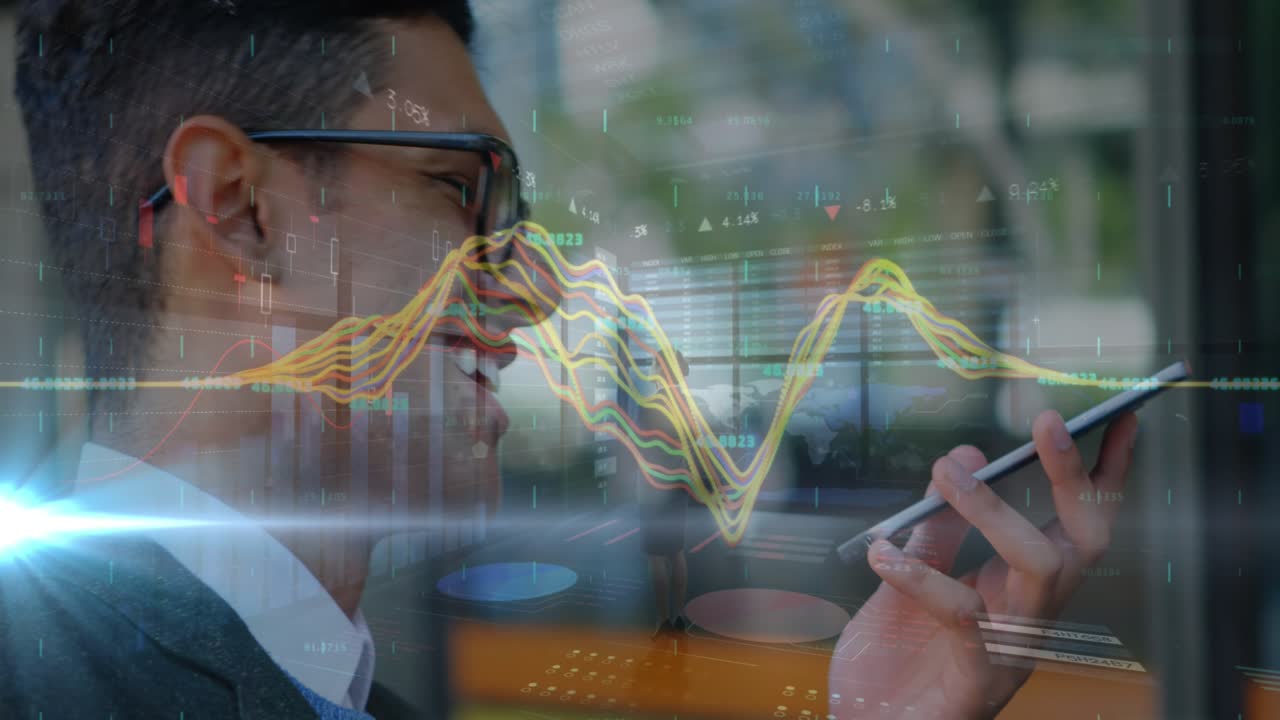 Animation of graphs over happy businessman using smartphone