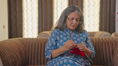 Old-Indian-woman-doing-knitting-work