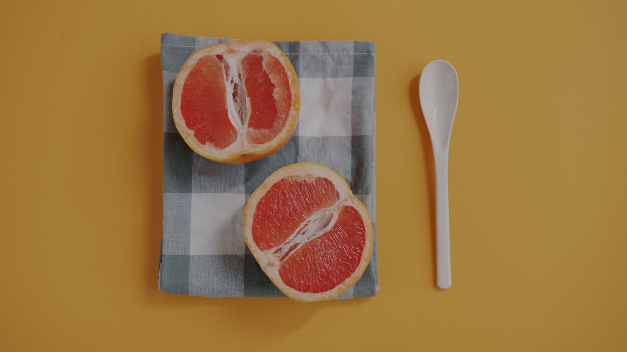 Grapefruit slices on a checkered napkin