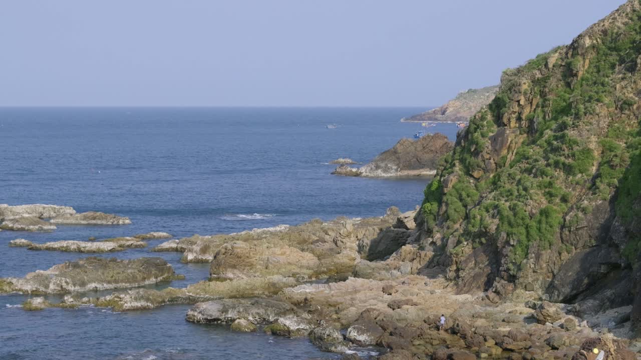 View out on ocean and cliffs from high above viewpoint