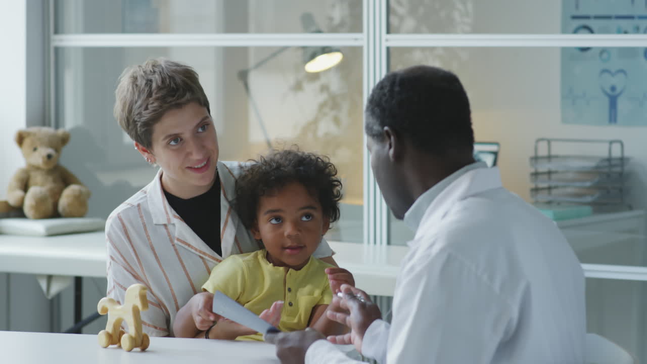 Mother and Little Kid in Pediatric Clinic