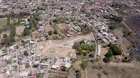 rural and marginalised area of amatitan with brick houses, jalisco, drone shot, panoramic view