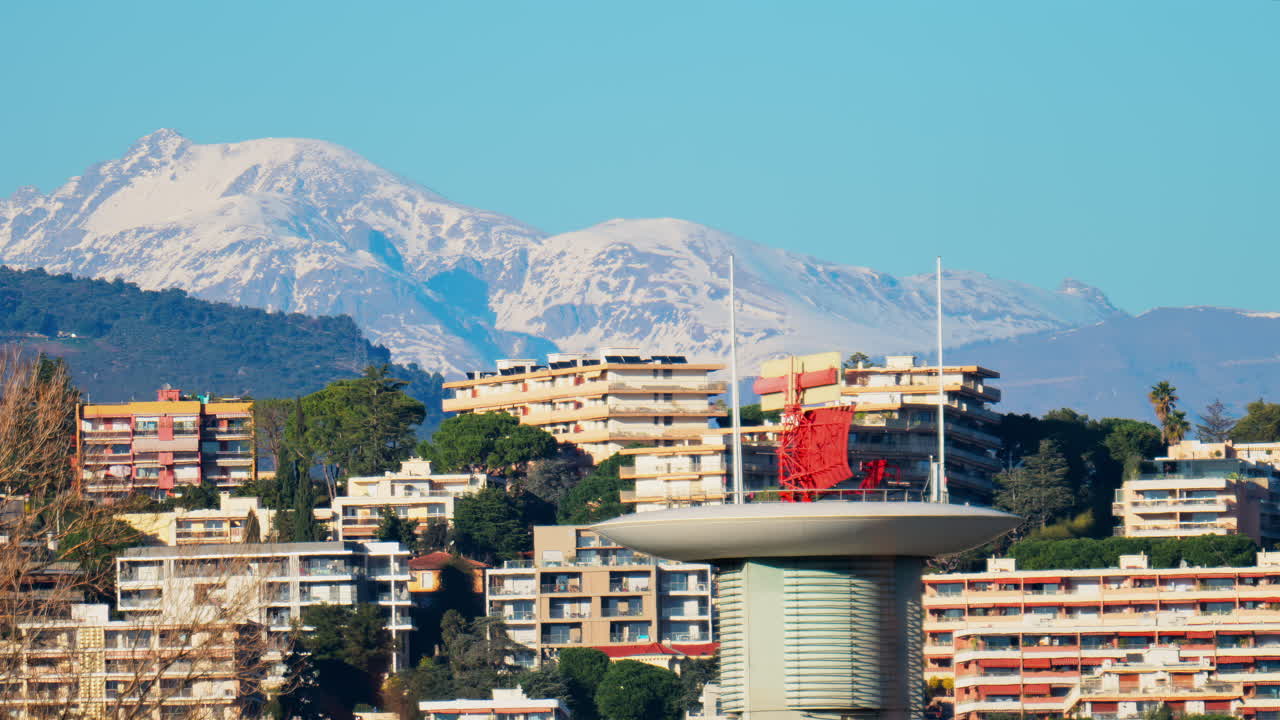 View of the radar antenna at Nice airport, France, mountains in the background