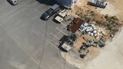 Drone-footage-of-military-ground-forces-in-army-trucks