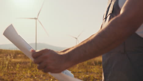 wind turbine technician reviewing plans