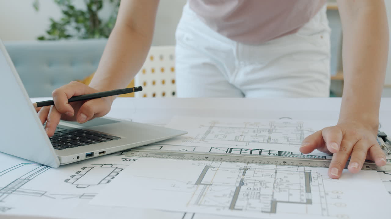 Architect Working on House Plans