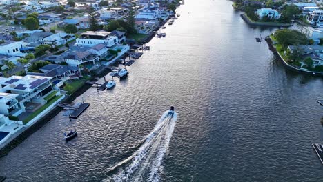 luxury homes along a canal - aerial view