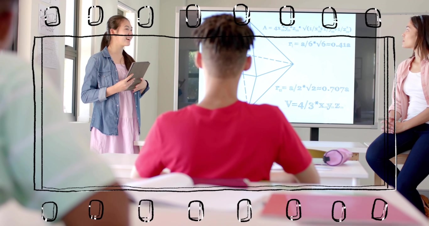 Studerende præsenterer ved at trykke på en tablet og forklarer et geometri-diagram for klassen, mens et rødt symbol ser med.
