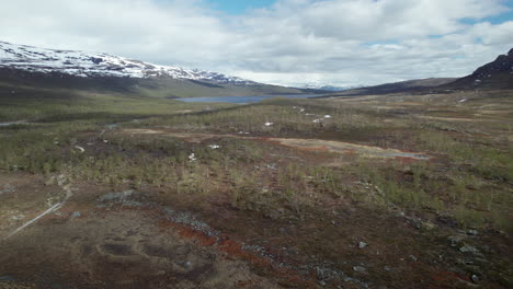 aerial view of stunning serene swedish mountains and river landscape, summer on the kungsleden in the abisko national park