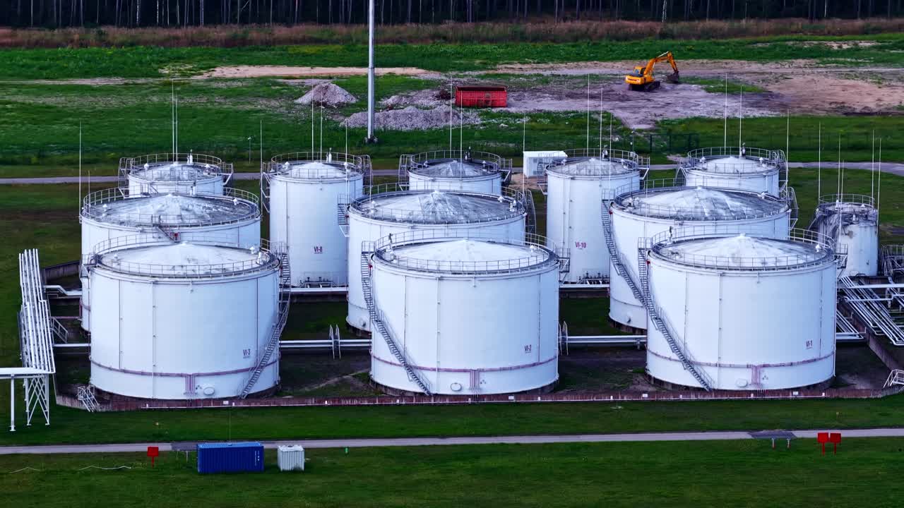 Oil storage tanks industrial depot petroleum production refinery plant factory, aerial