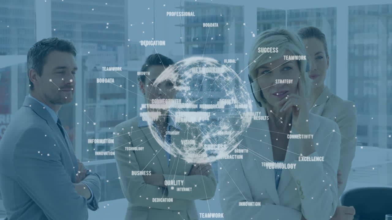 Global network and business keywords animation over diverse business team in office