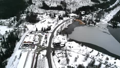 drone shot of a snowy landscape in sweden.