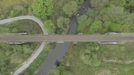 straight leading symmetrical railway bridge at countryside kerry ireland