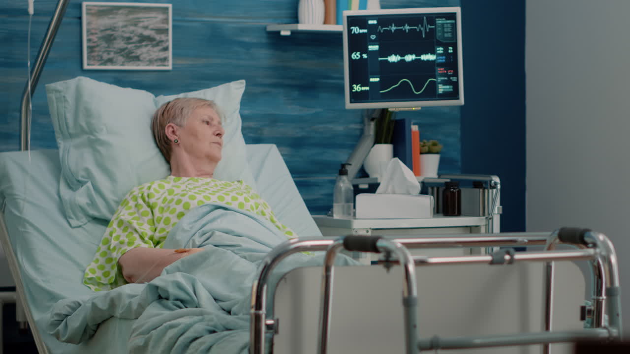 Elder patient with sickness laying in hospital bed