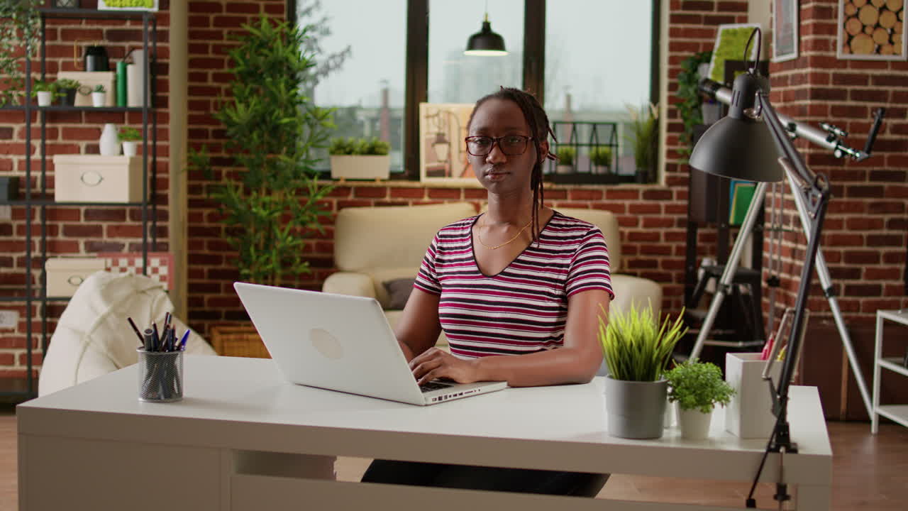 Woman working on laptop in office
