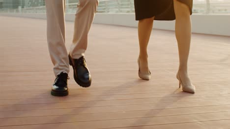 couple walking on a bridge