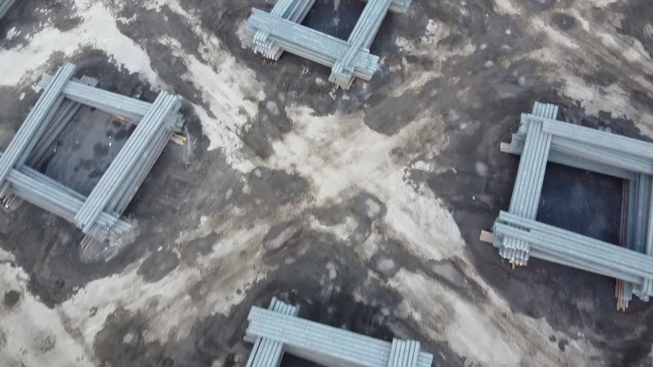 Top down view of steel mill, steel bar stock