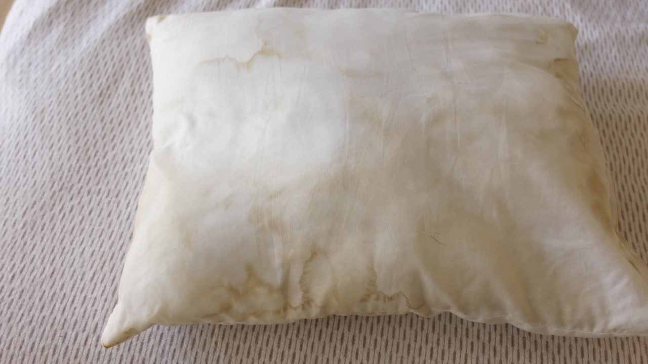 Stained White Pillow
