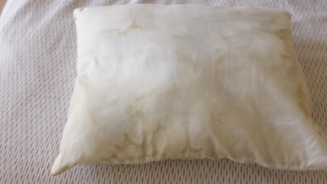 stained white pillow