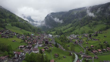 Picturesque-Tourist-Attraction-Town-of-Lauterbrunnen,-Switzerland---Aerial