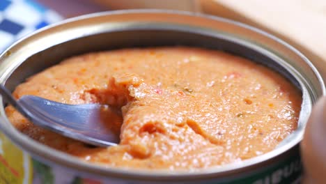 canned tuna on wooden table