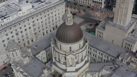 drone shot orbiting three graces 02