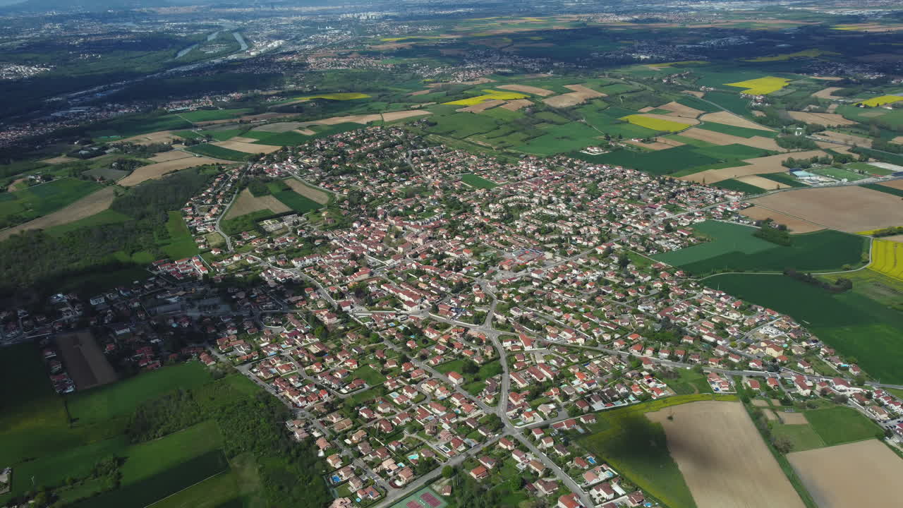 Aerial View of a French Town Surrounded by Fields