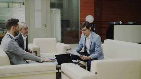 business meeting in office lobby