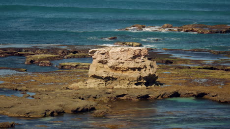 iconic stack sand stone rock formations along the back beach of sorrento, australia